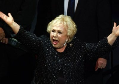 Actress Doris Roberts reacts as she is awarded for
